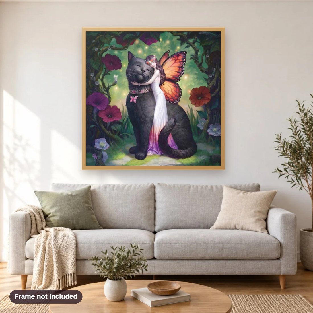Giant Cat & Fairy diamond painting shown framed on a living room wall above a sofa