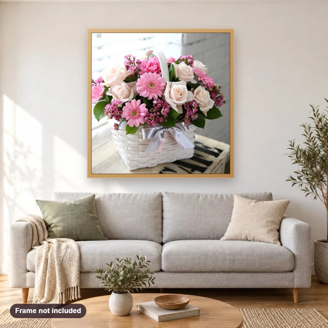 Gift Flowers Basket diamond painting shown framed on a living room wall above a sofa