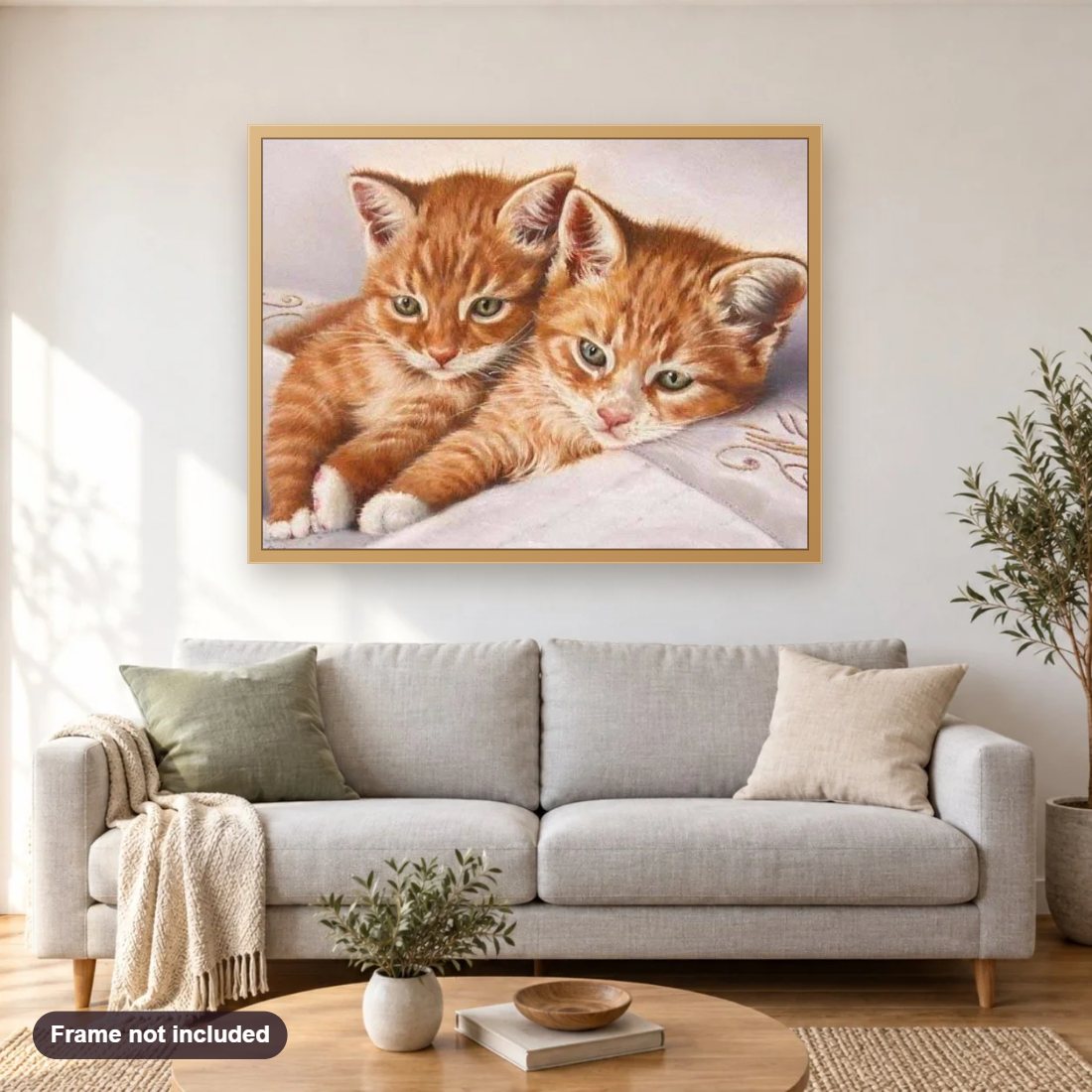 Ginger Cat Pair diamond painting shown framed on a living room wall above a sofa