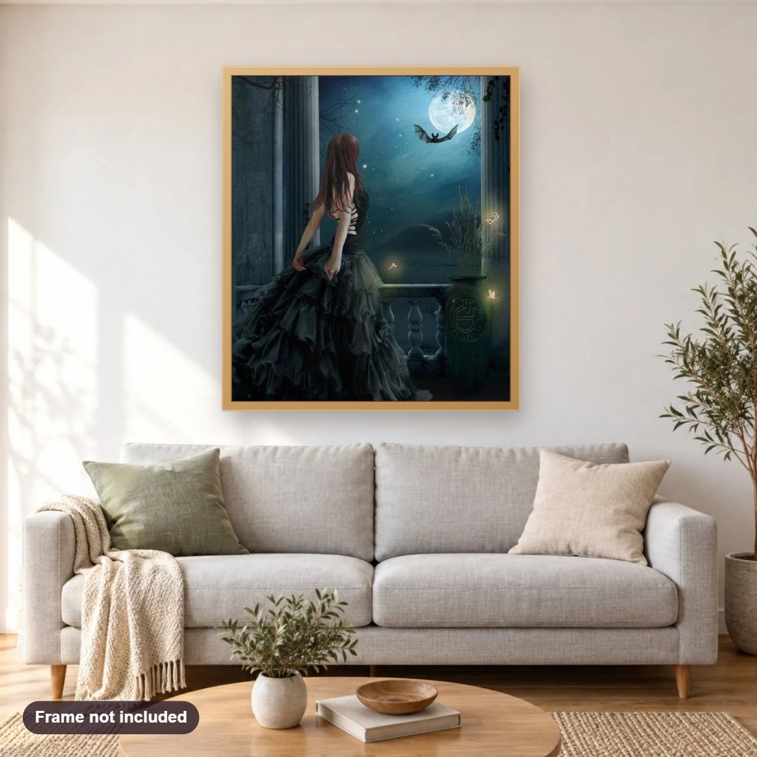 Girl in Black Starring Moon diamond painting shown framed on a living room wall above a sofa