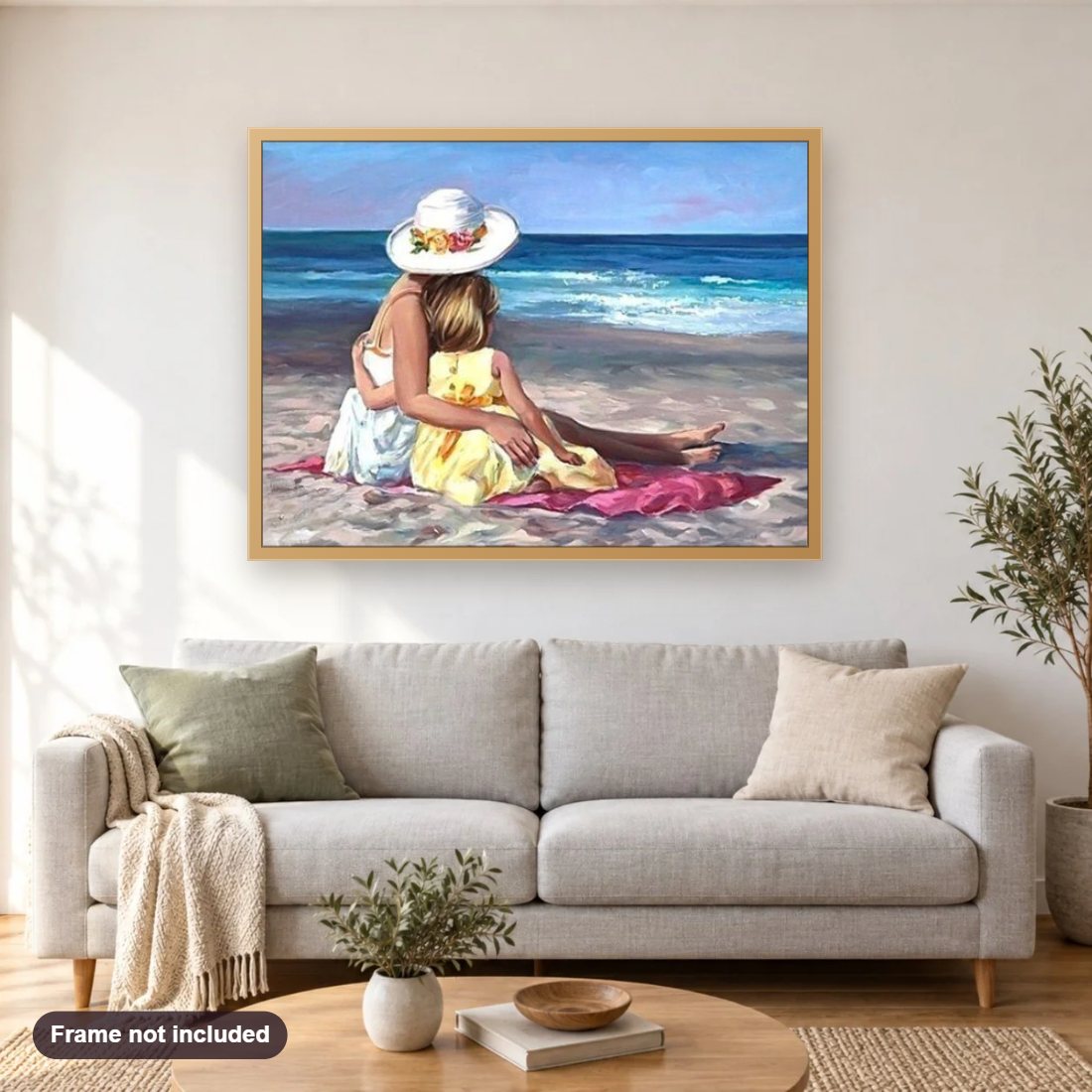 Girl & Mother on the Beach diamond painting shown framed on a living room wall above a sofa