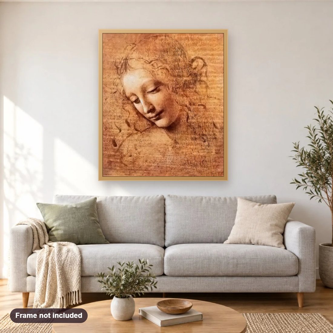 Girl Portrait diamond painting shown framed on a living room wall above a sofa