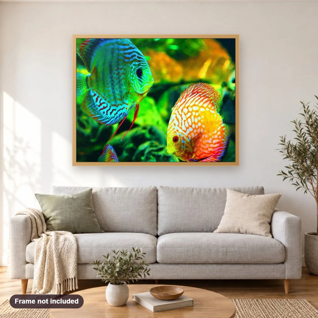 GloFish diamond painting shown framed on a living room wall above a sofa