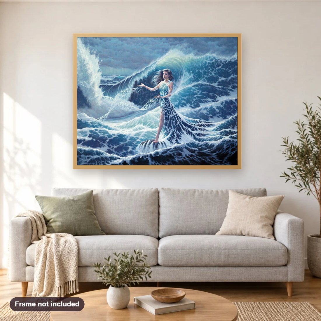 Goddess of Water diamond painting shown framed on a living room wall above a sofa