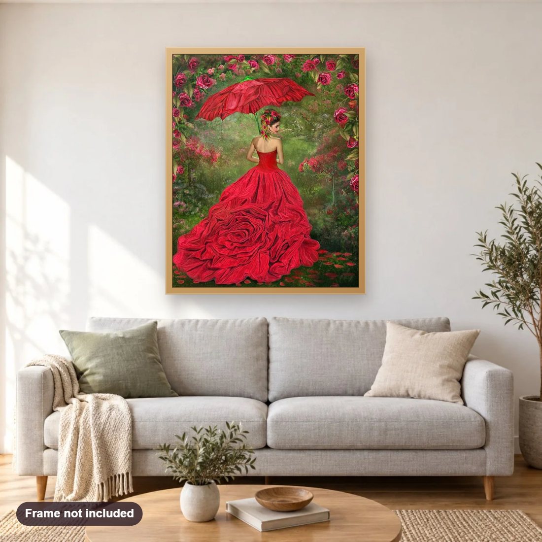 Gorgeous Girl in Rose Gown diamond painting shown framed on a living room wall above a sofa