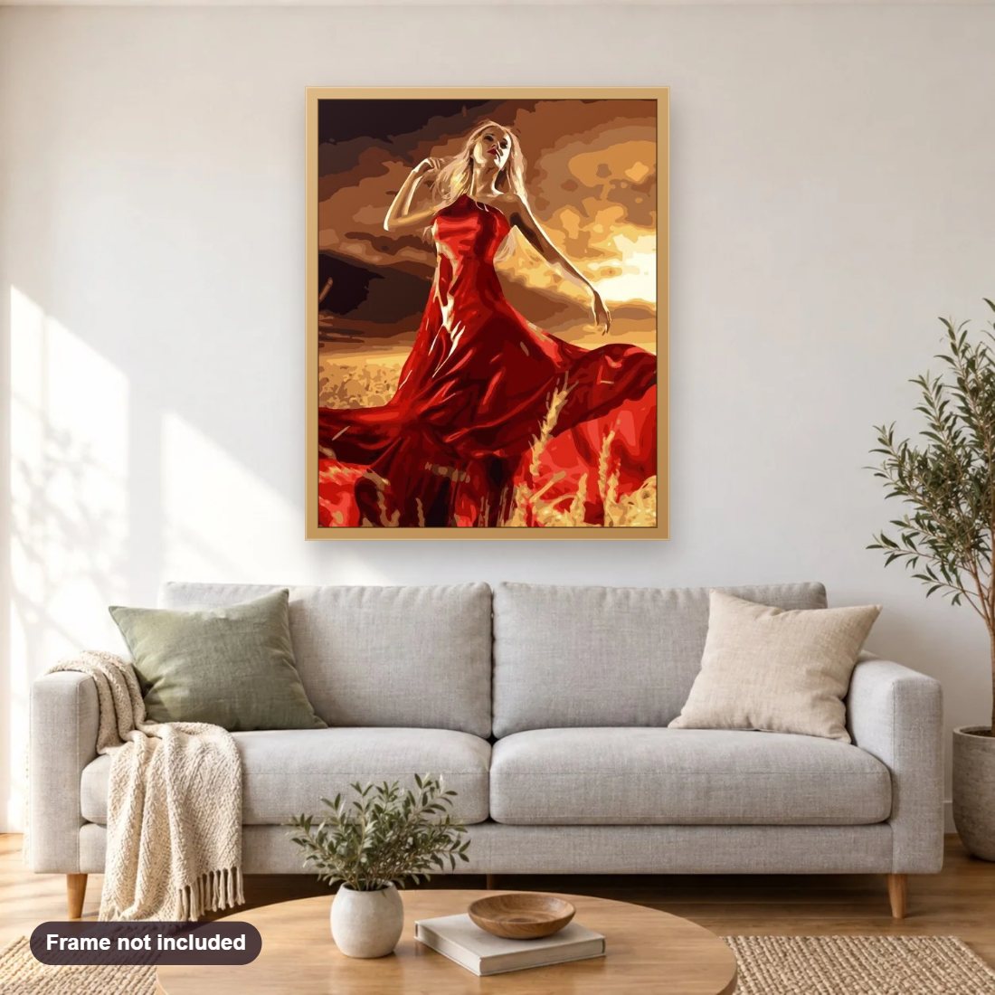 Gorgeous Lady in Fields diamond painting shown framed on a living room wall above a sofa