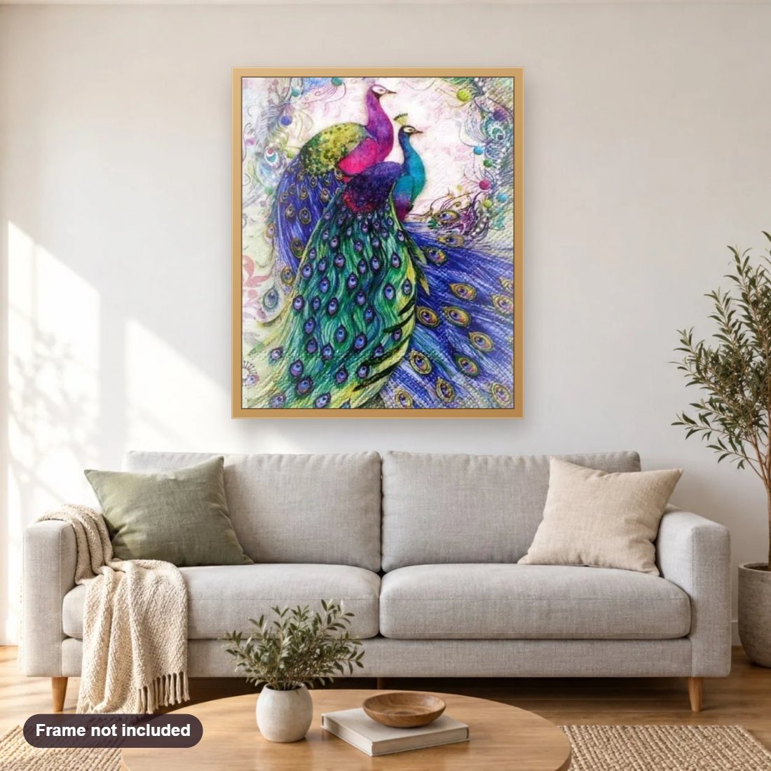 Gorgeous Peacocks Pair diamond painting shown framed on a living room wall above a sofa