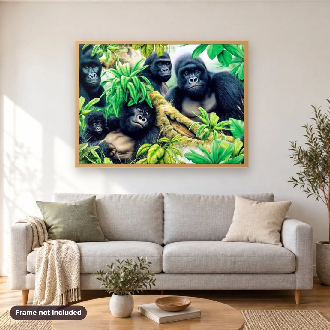 Gorilla Family diamond painting shown framed on a living room wall above a sofa