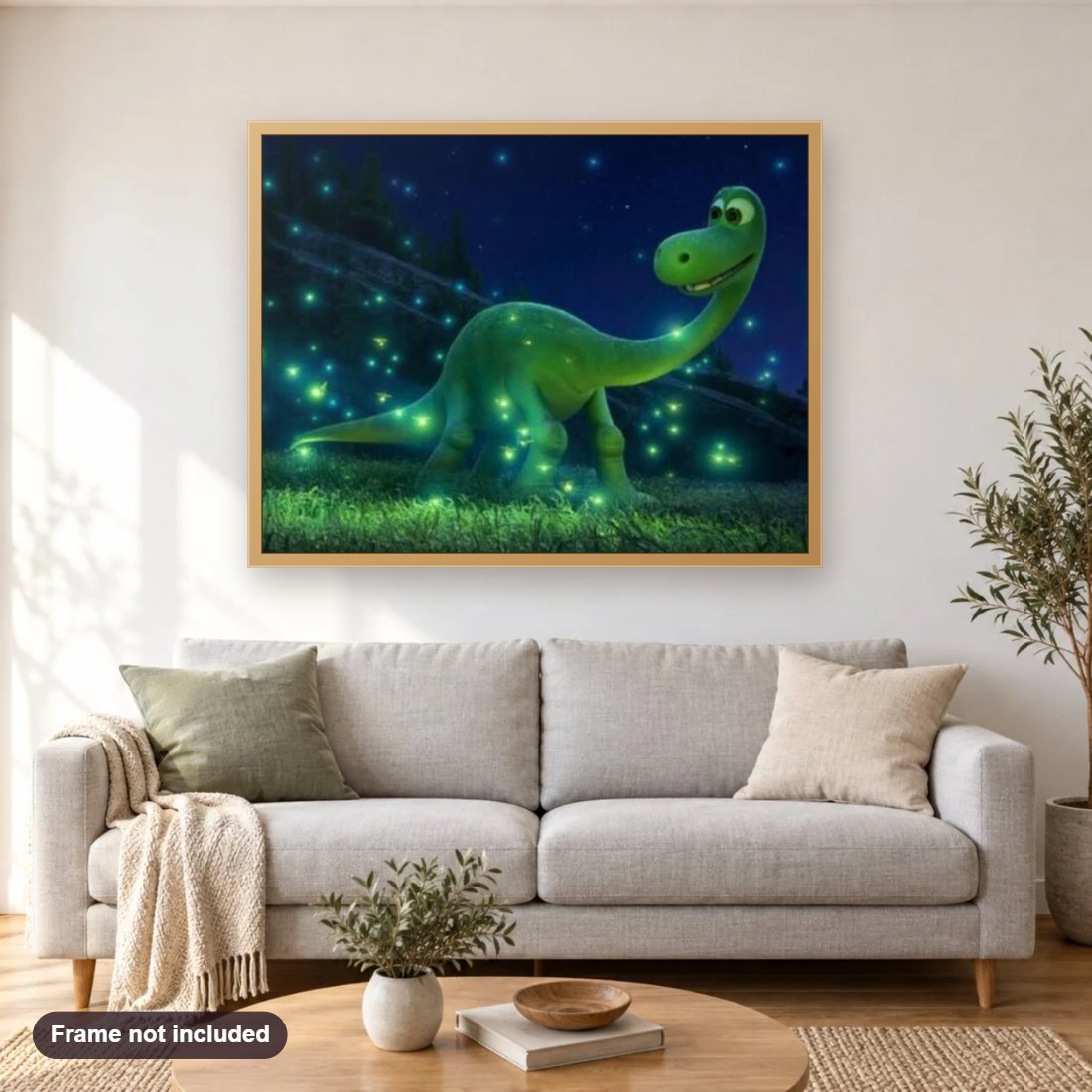 Green Dinosaur diamond painting shown framed on a living room wall above a sofa