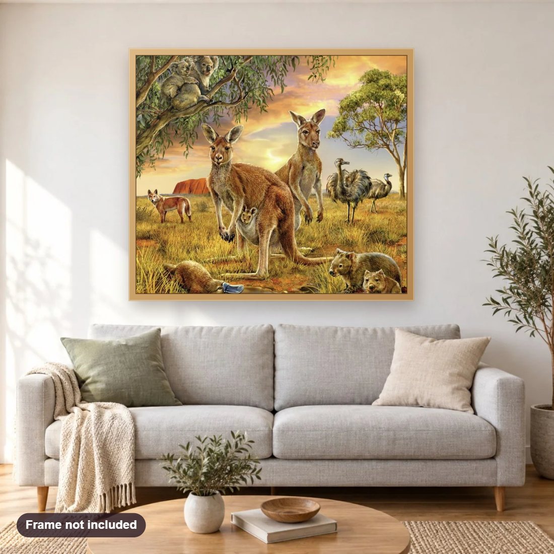 Group of Australian Animals diamond painting shown framed on a living room wall above a sofa