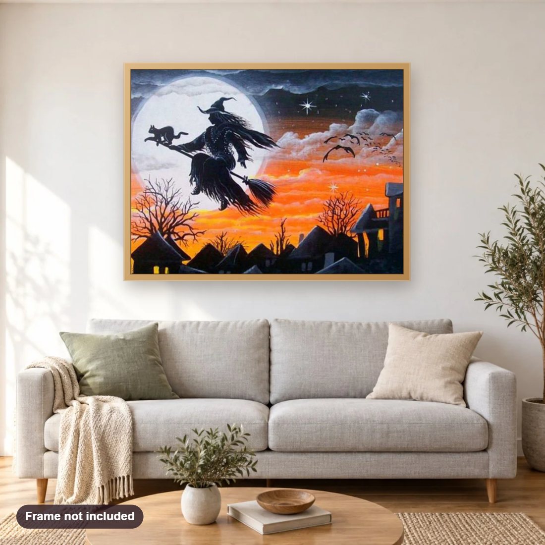 Gypsy Witch diamond painting shown framed on a living room wall above a sofa