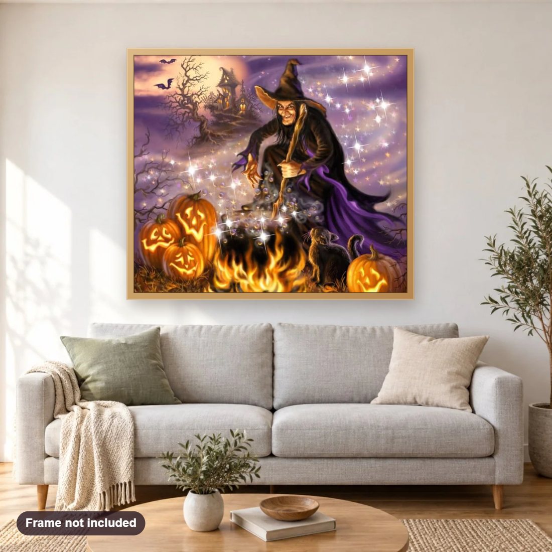 Halloween Witch diamond painting shown framed on a living room wall above a sofa