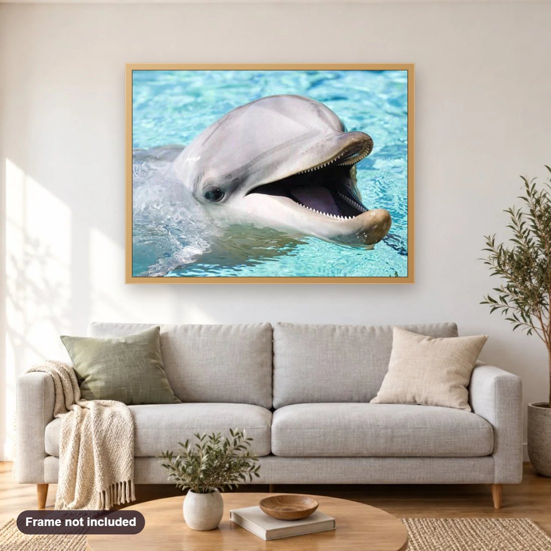 Happy Dolphin diamond painting shown framed on a living room wall above a sofa