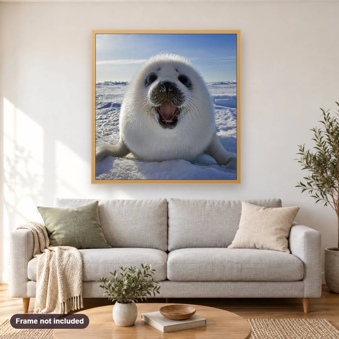 Happy White Seal Fish diamond painting shown framed on a living room wall above a sofa