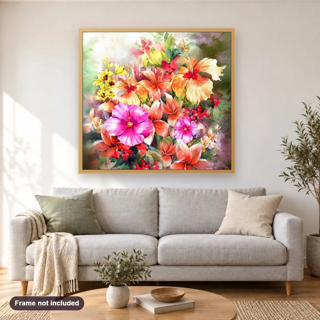 Hibiscus Rose Mellows diamond painting shown framed on a living room wall above a sofa