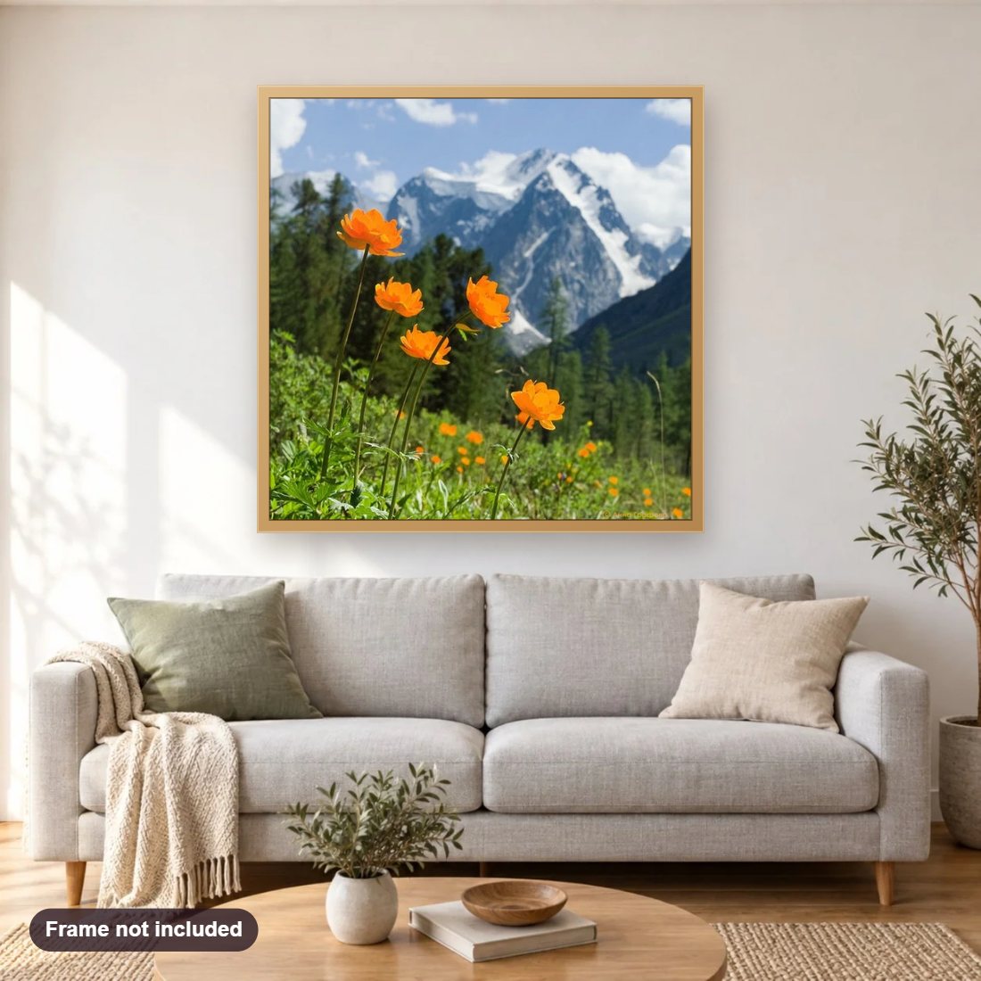 High Mountains & Yellow Flowers diamond painting shown framed on a living room wall above a sofa