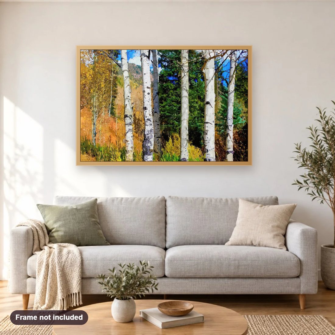 Hillside Aspen Grove diamond painting shown framed on a living room wall above a sofa