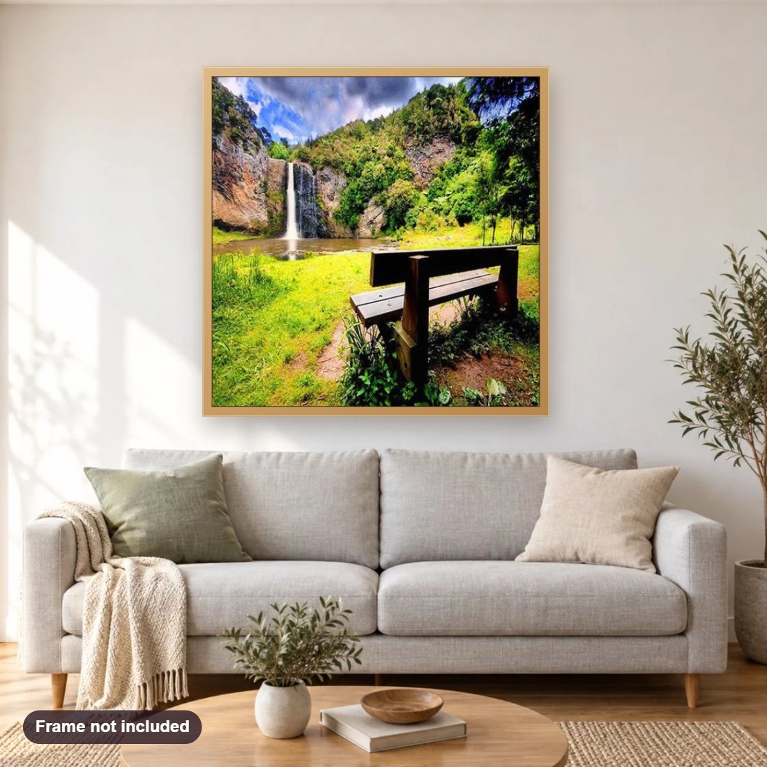 Hunua diamond painting shown framed on a living room wall above a sofa