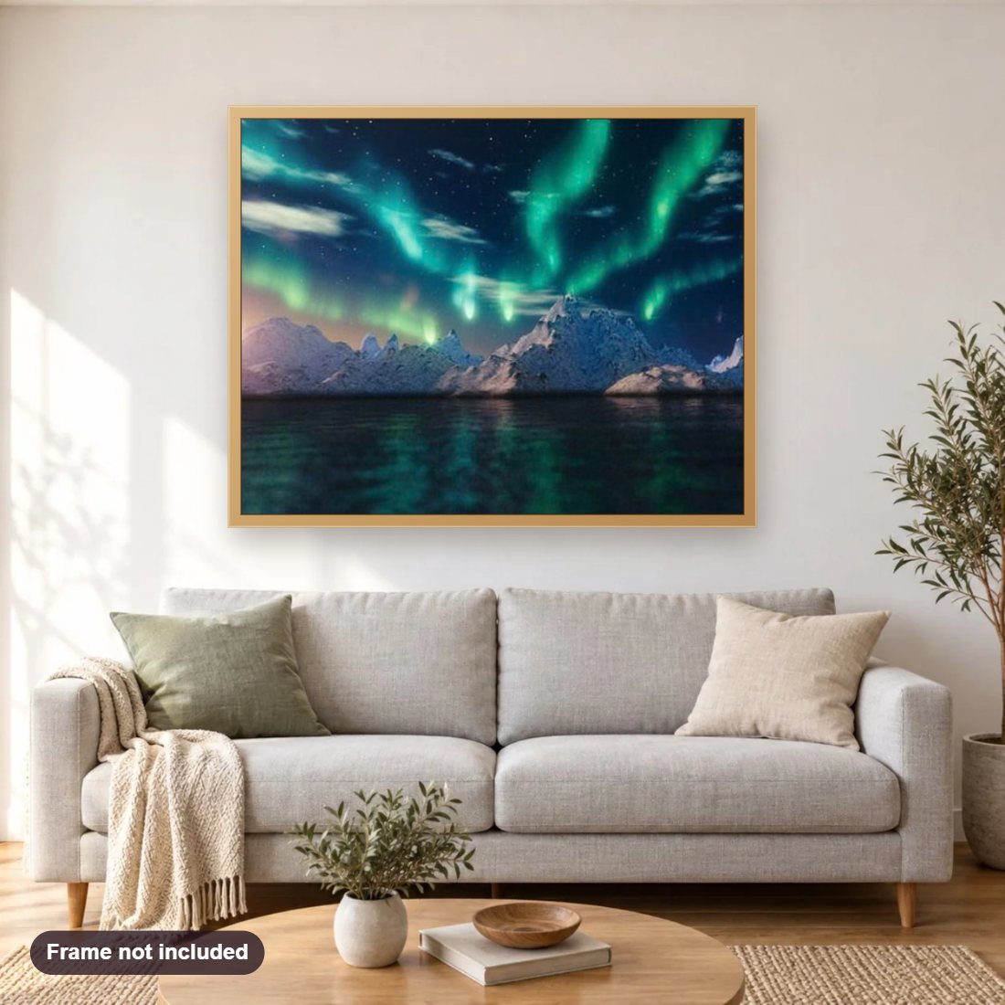 Ice Bergs & Northern Lights diamond painting shown framed on a living room wall above a sofa