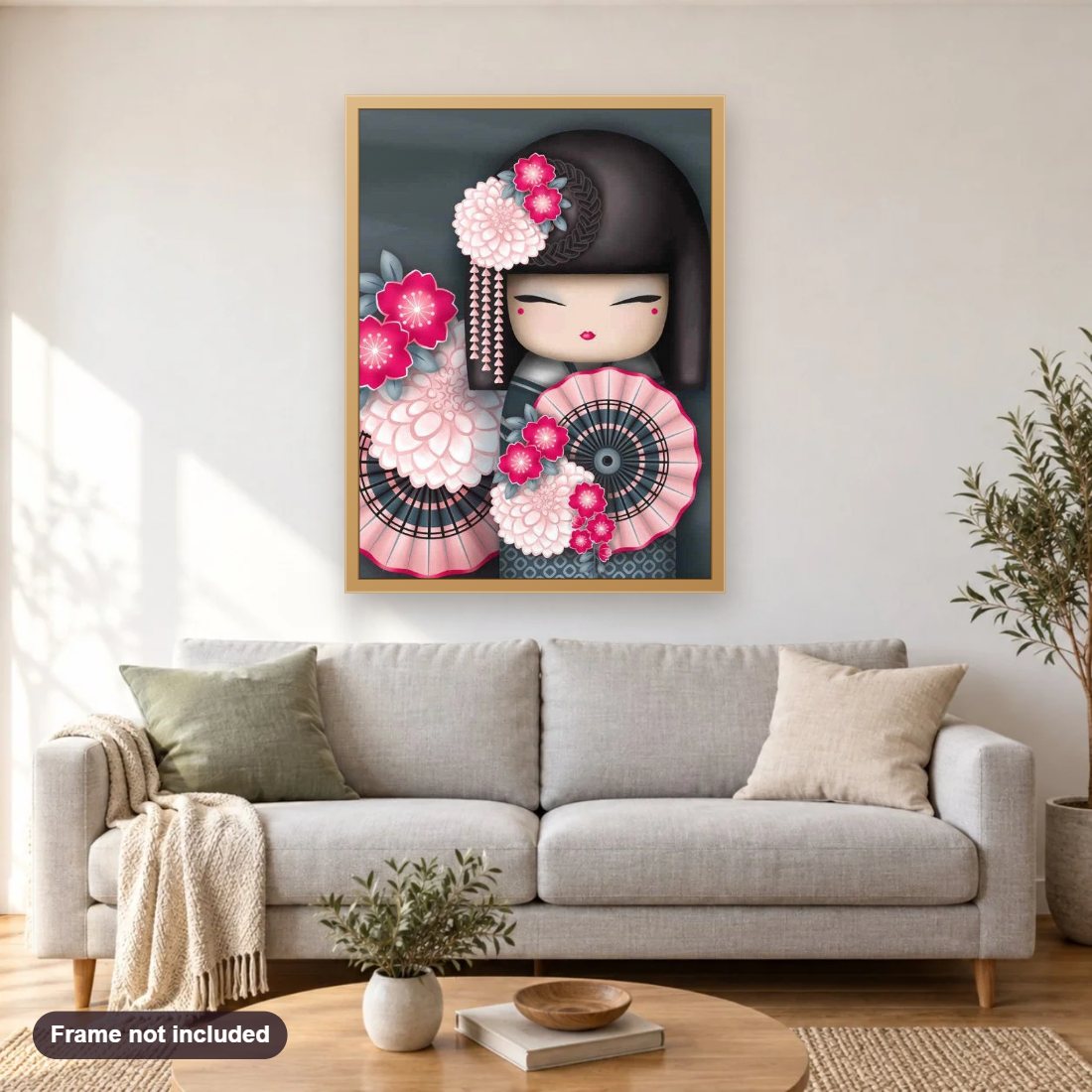Japanese Doll diamond painting shown framed on a living room wall above a sofa