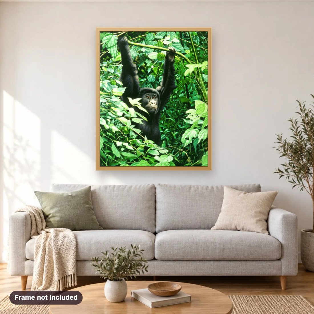 Juvenile Gorilla diamond painting shown framed on a living room wall above a sofa
