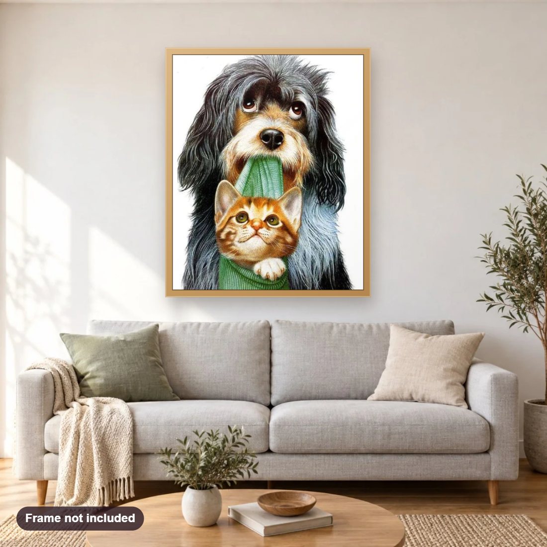 Kitten & Puppy diamond painting shown framed on a living room wall above a sofa
