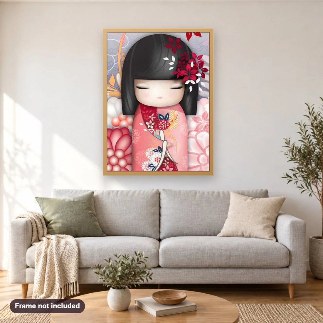Kokeshi Doll diamond painting shown framed on a living room wall above a sofa