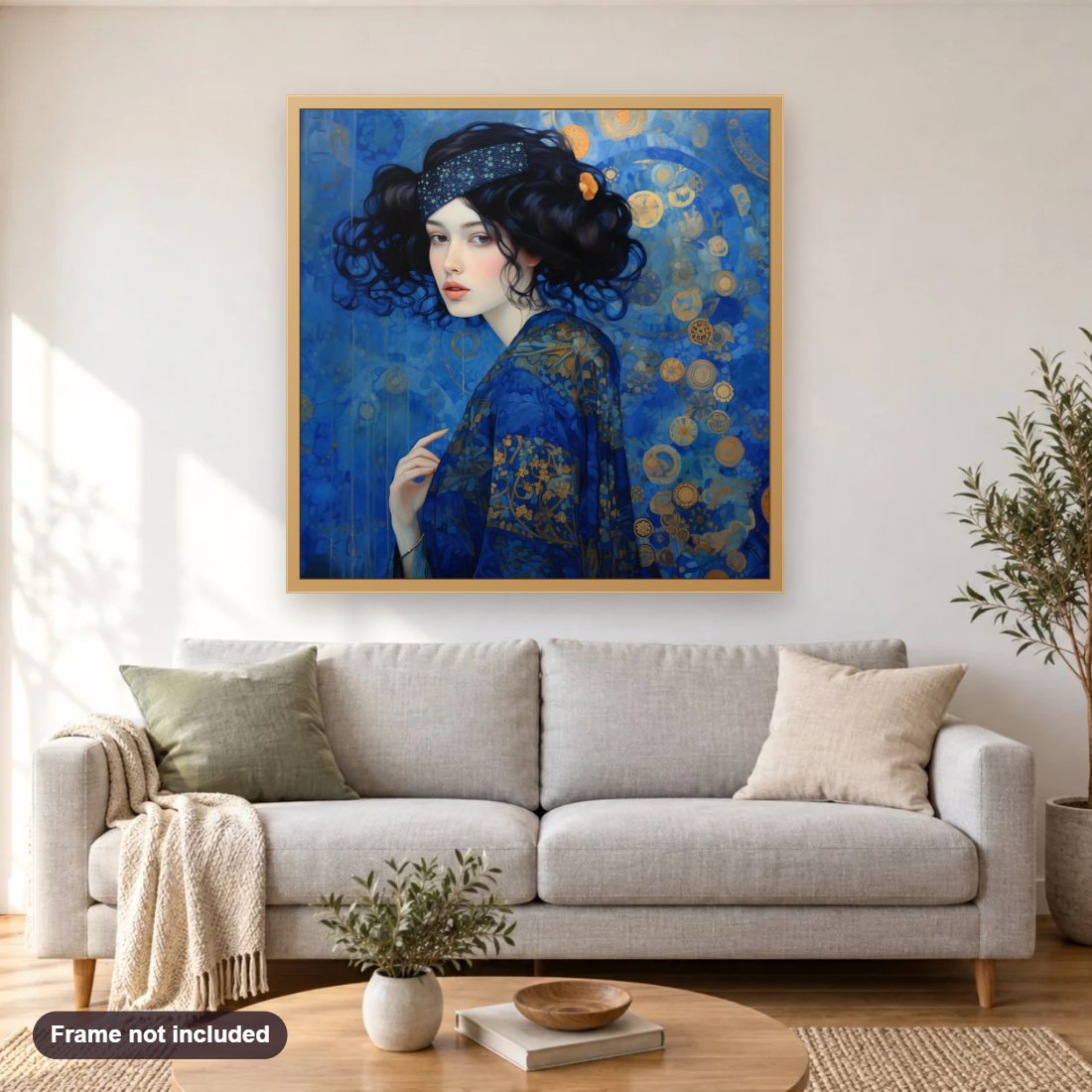 Lady in Gold & Blue diamond painting shown framed on a living room wall above a sofa