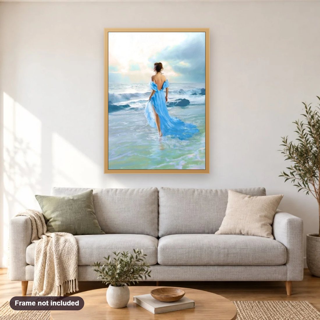 Lady Walking in Water diamond painting shown framed on a living room wall above a sofa
