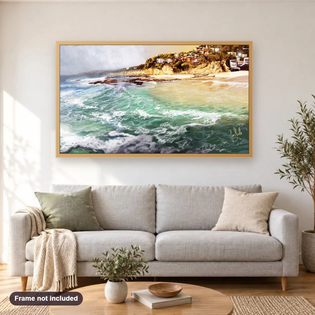 Laguna Beach diamond painting shown framed on a living room wall above a sofa