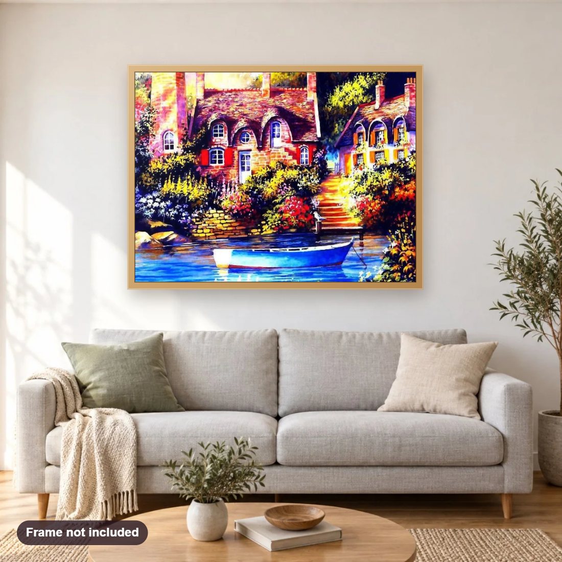Lake Front House & Boat diamond painting shown framed on a living room wall above a sofa