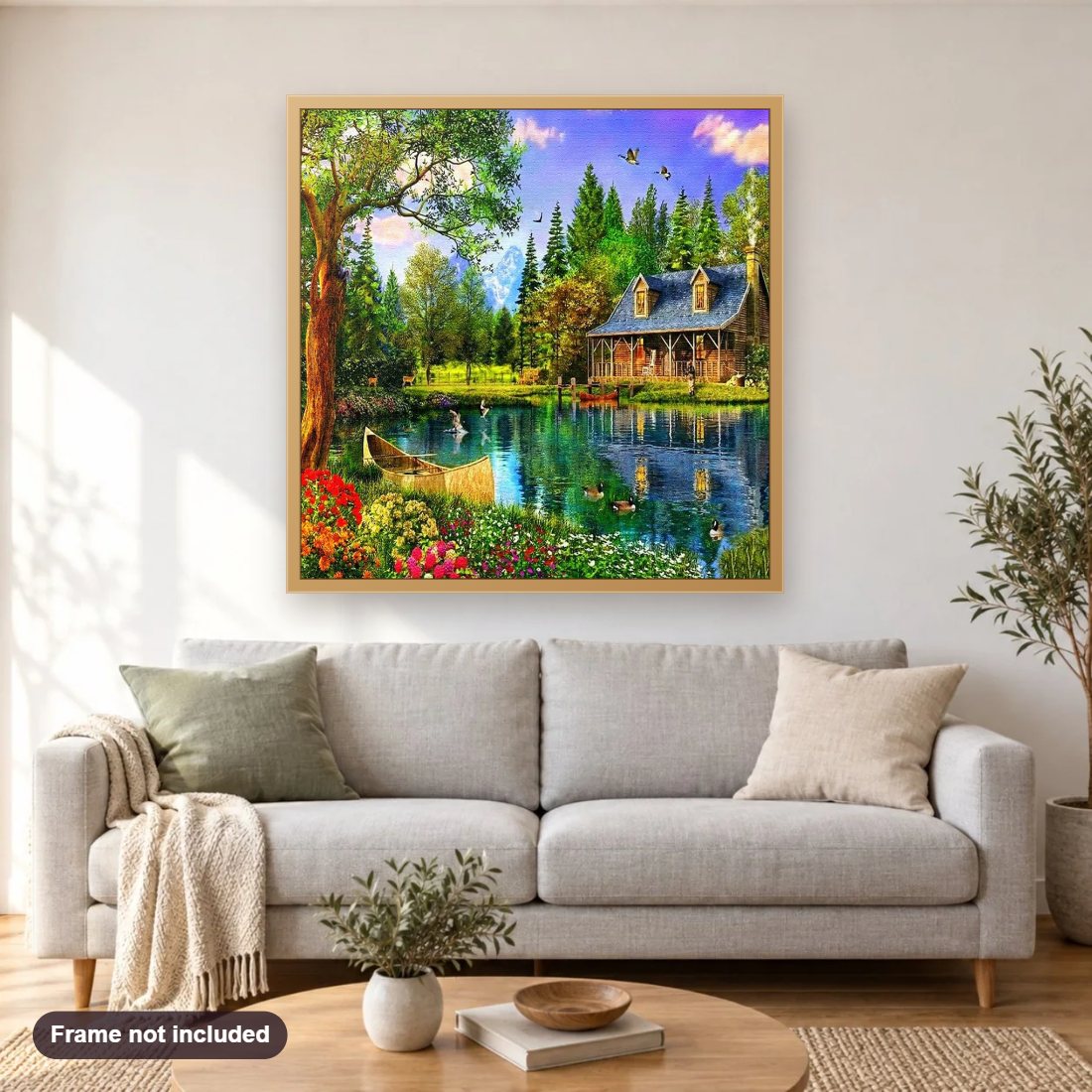 Lake Side House diamond painting shown framed on a living room wall above a sofa