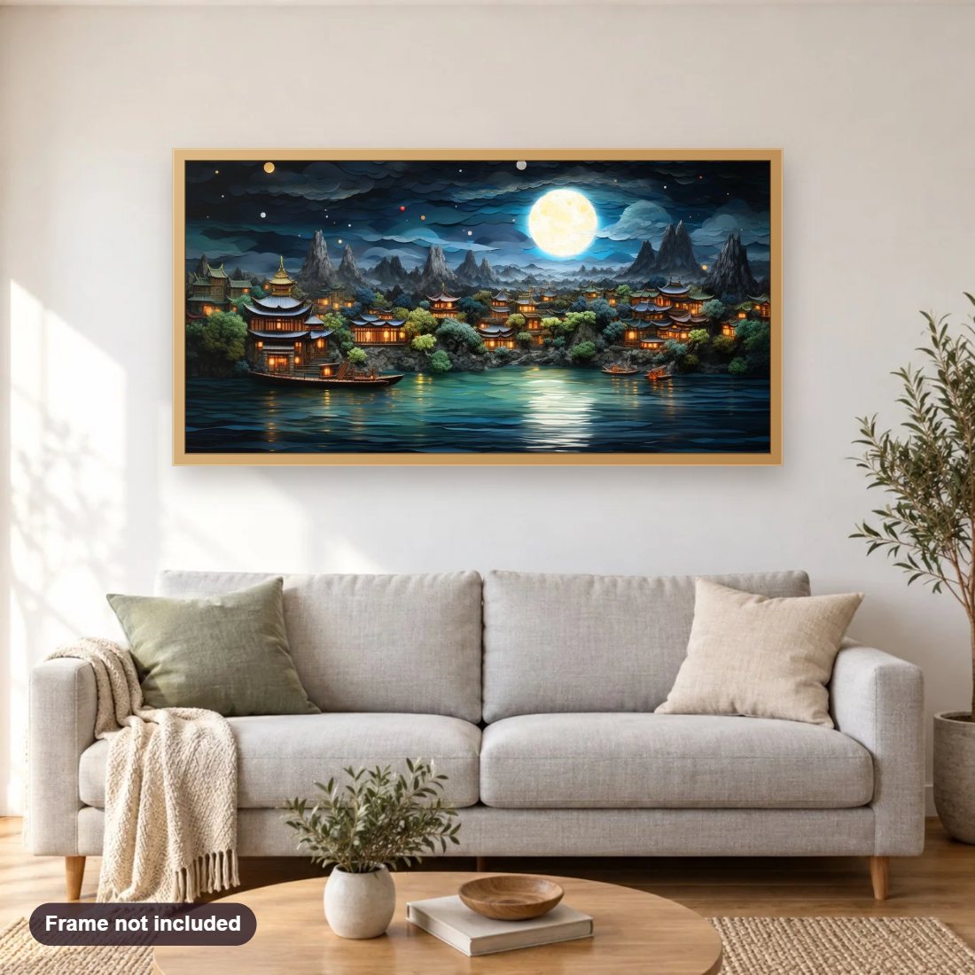 Lake Side View with Moon diamond painting shown framed on a living room wall above a sofa