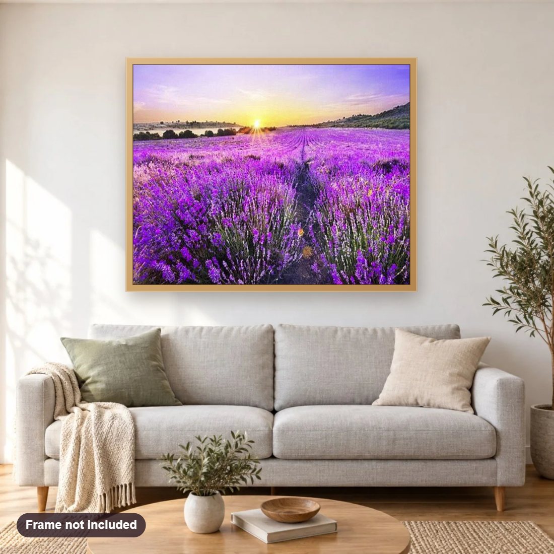 Lavender Fields & Sunset diamond painting shown framed on a living room wall above a sofa