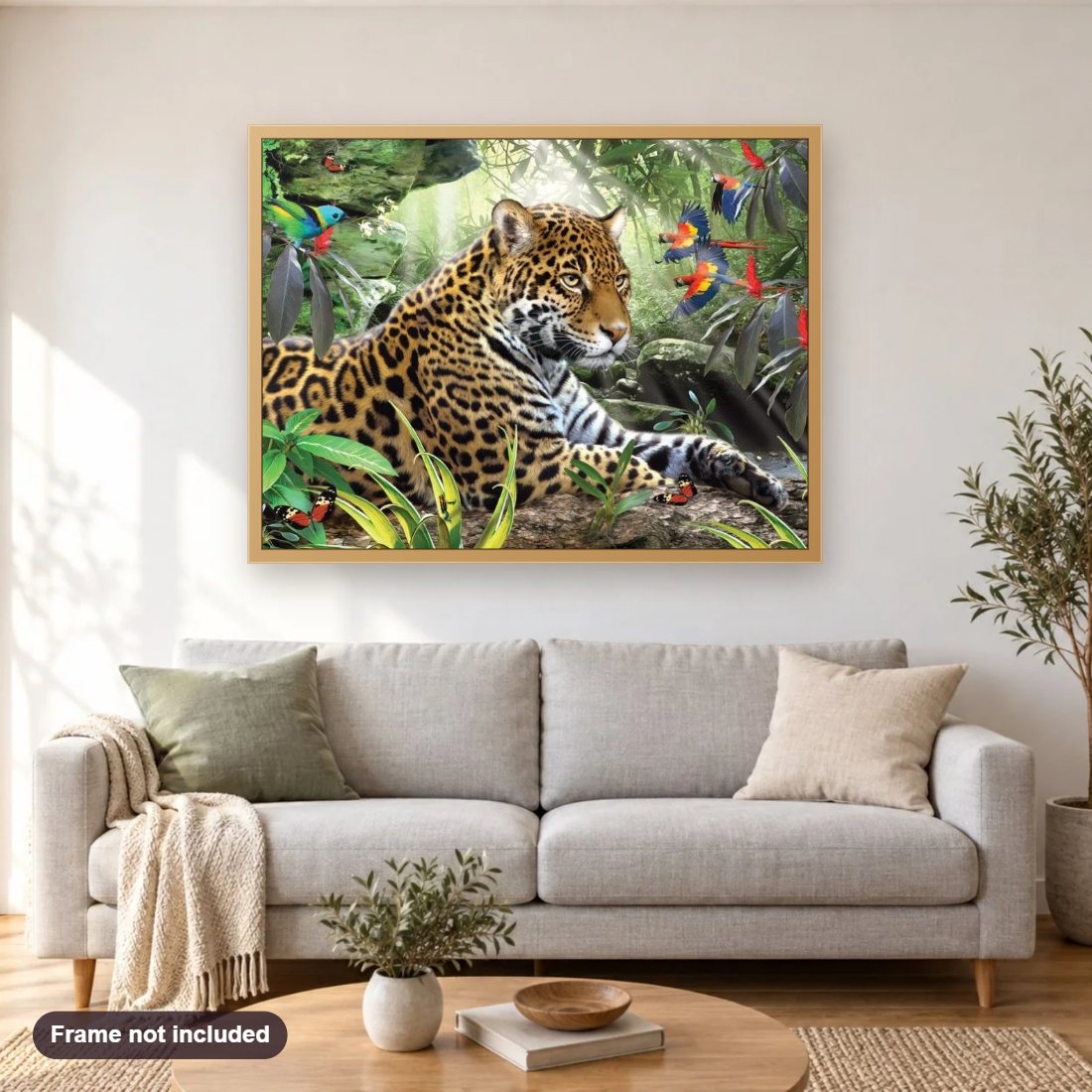 Leopard & African Parrots diamond painting shown framed on a living room wall above a sofa