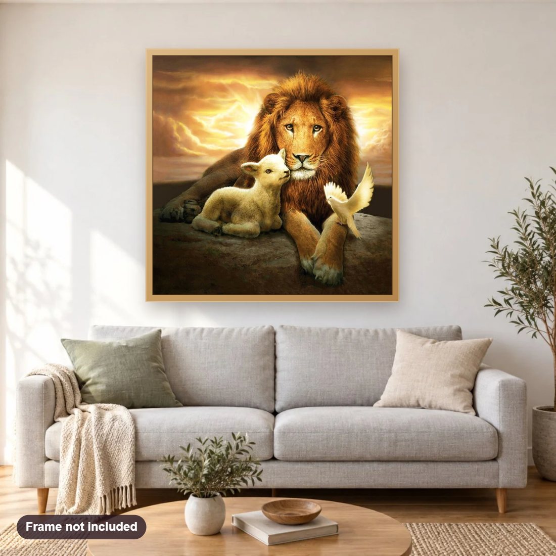 Lion, Lamb & Pigeon diamond painting shown framed on a living room wall above a sofa