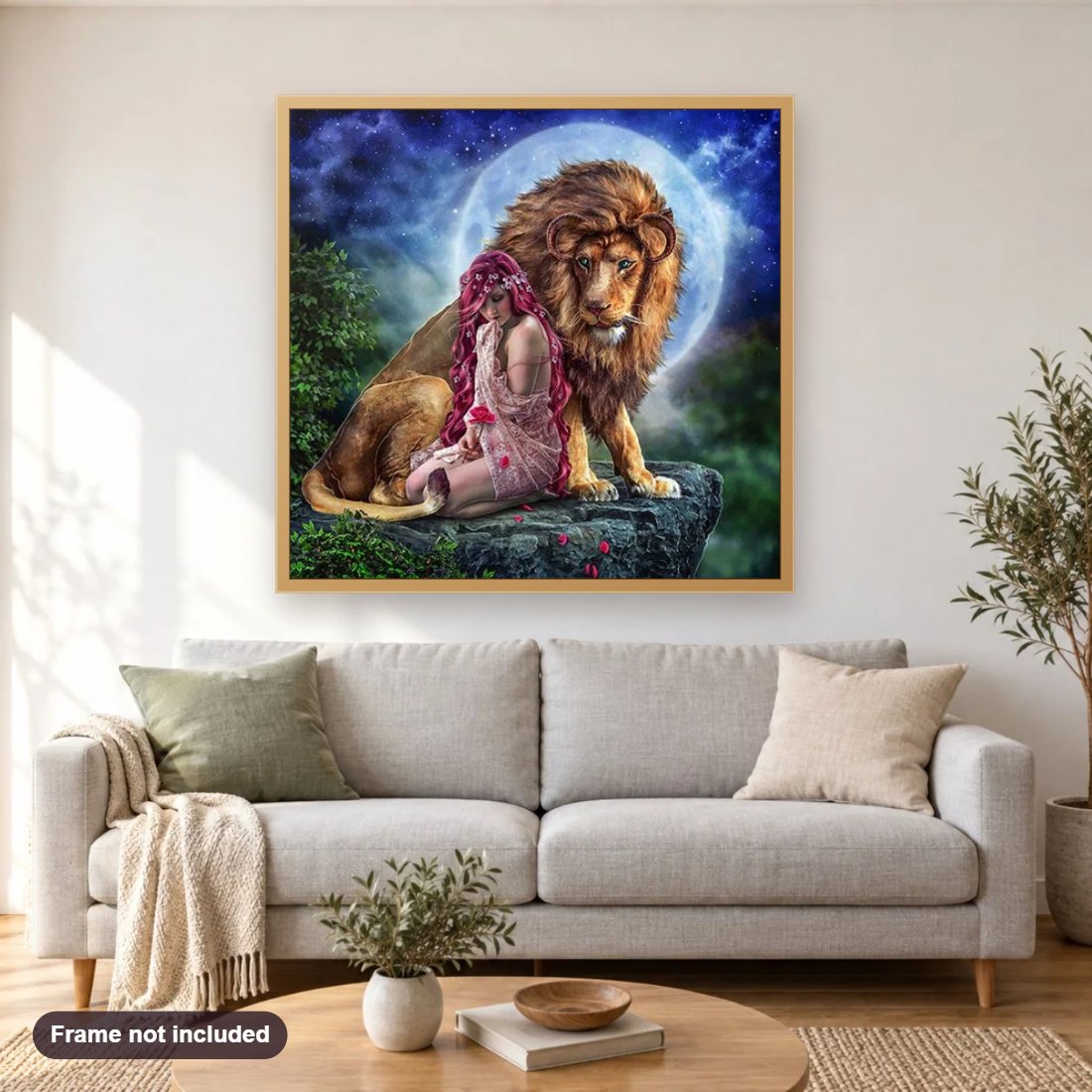 Lion Queen diamond painting shown framed on a living room wall above a sofa