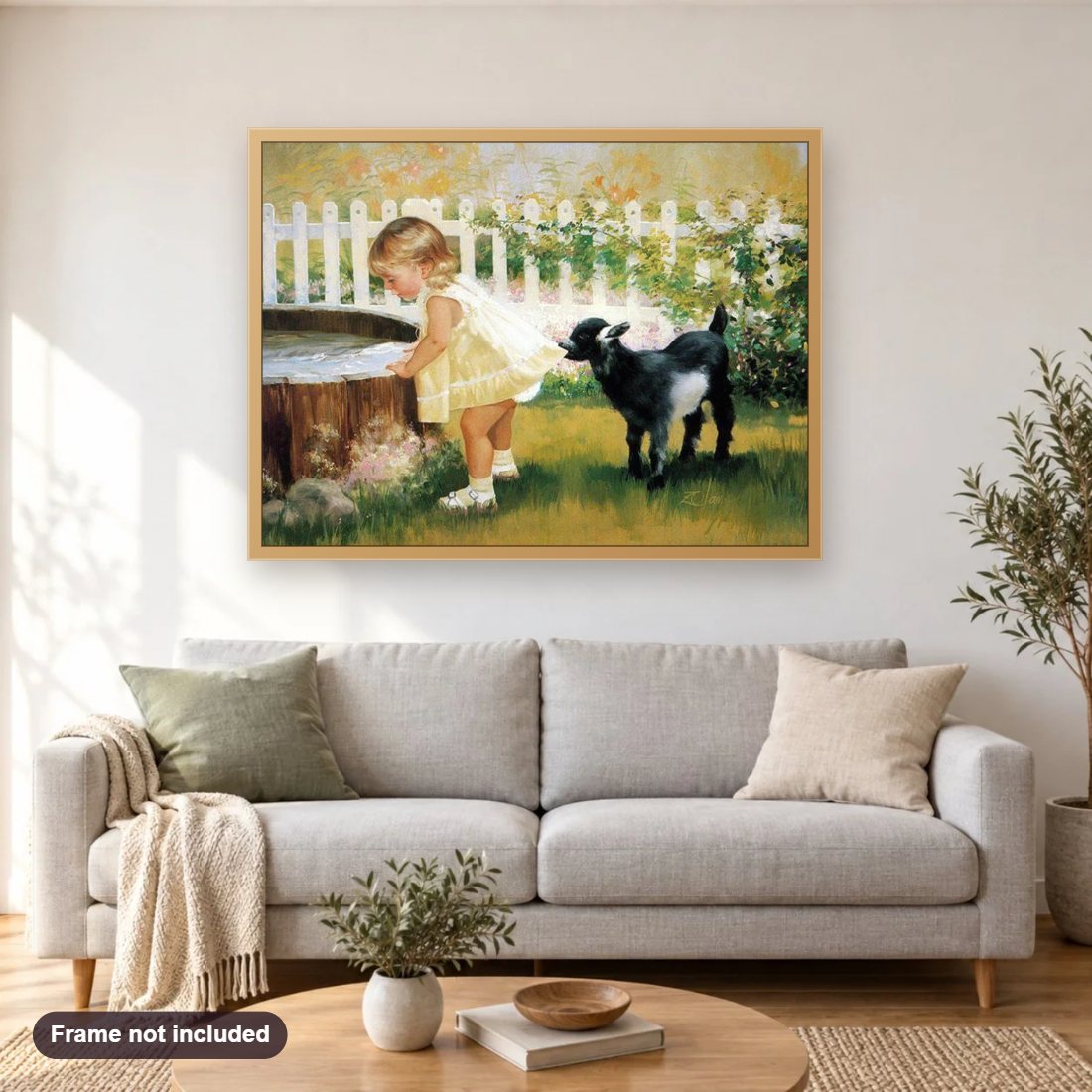 Little Girl with Lamb diamond painting shown framed on a living room wall above a sofa