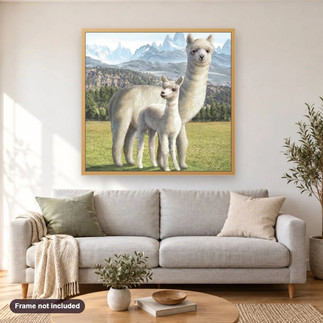 Llama diamond painting shown framed on a living room wall above a sofa