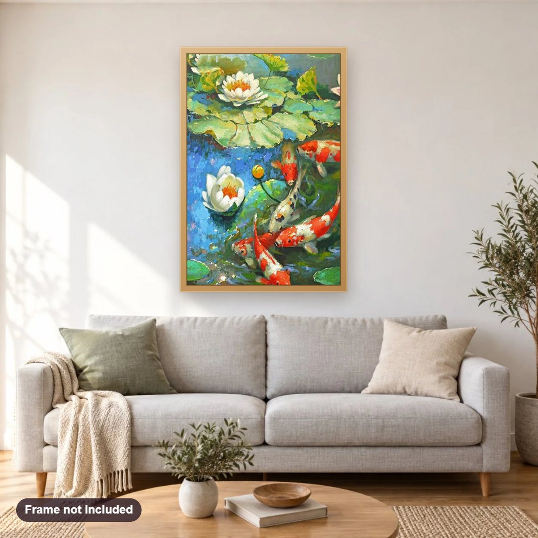 Lotus Flower & Koi Fish diamond painting shown framed on a living room wall above a sofa