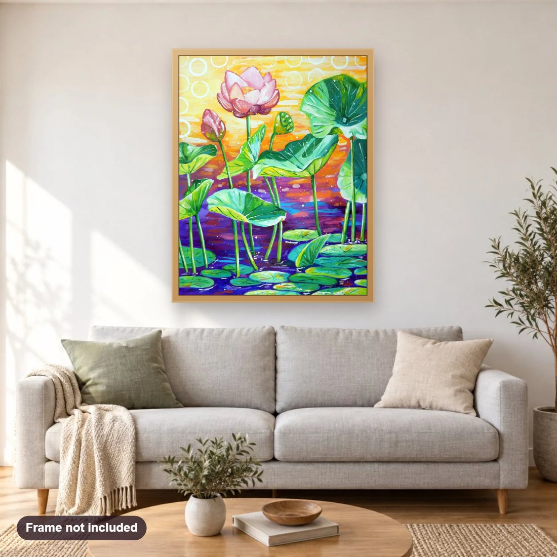 Lotus Pond Art by Sandra Trubin diamond painting shown framed on a living room wall above a sofa