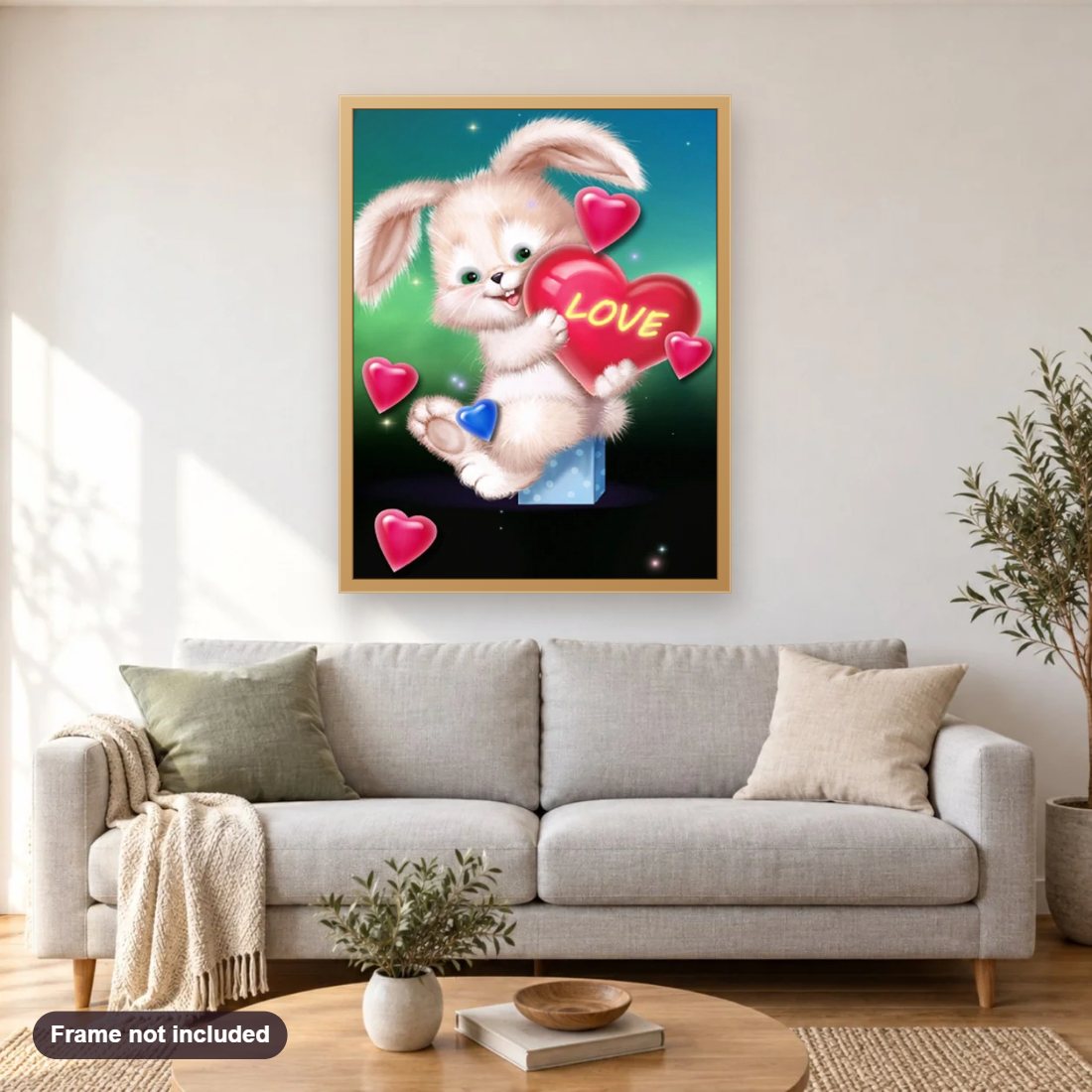 Love Bunny diamond painting shown framed on a living room wall above a sofa