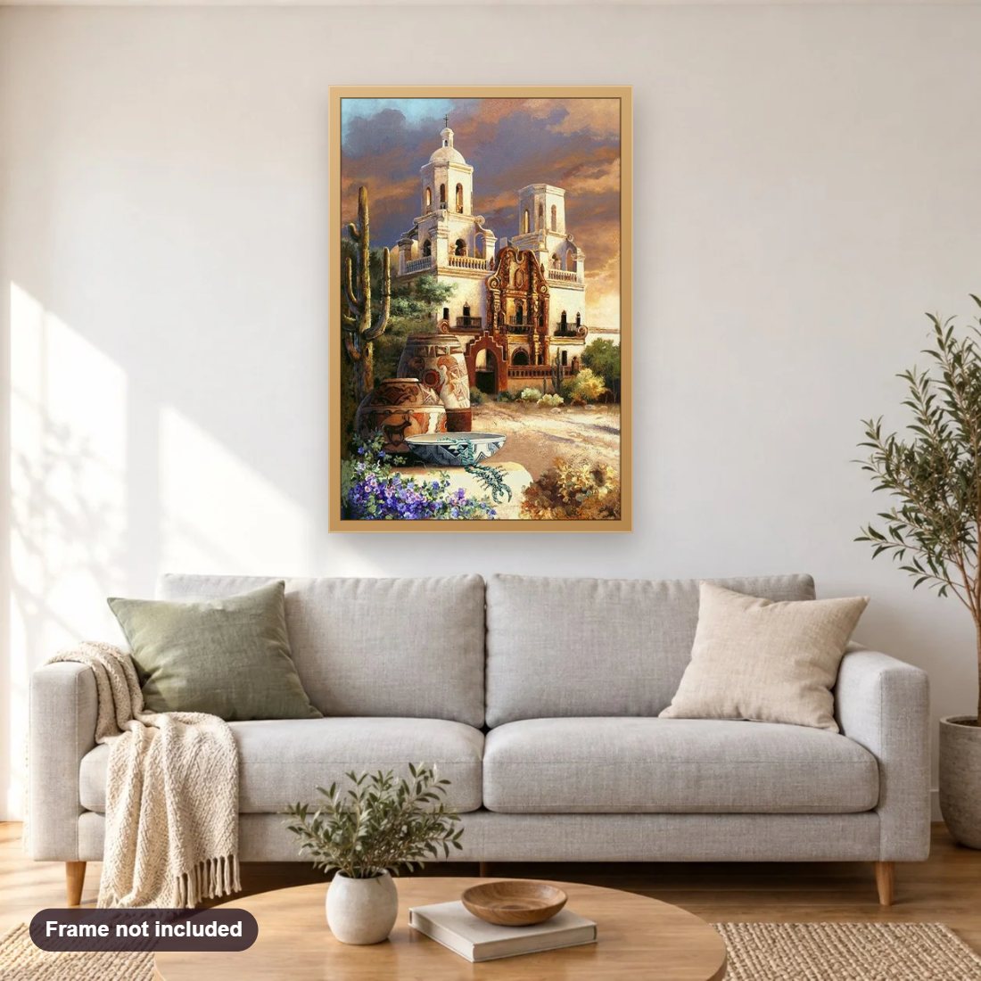 Mexican Church diamond painting shown framed on a living room wall above a sofa