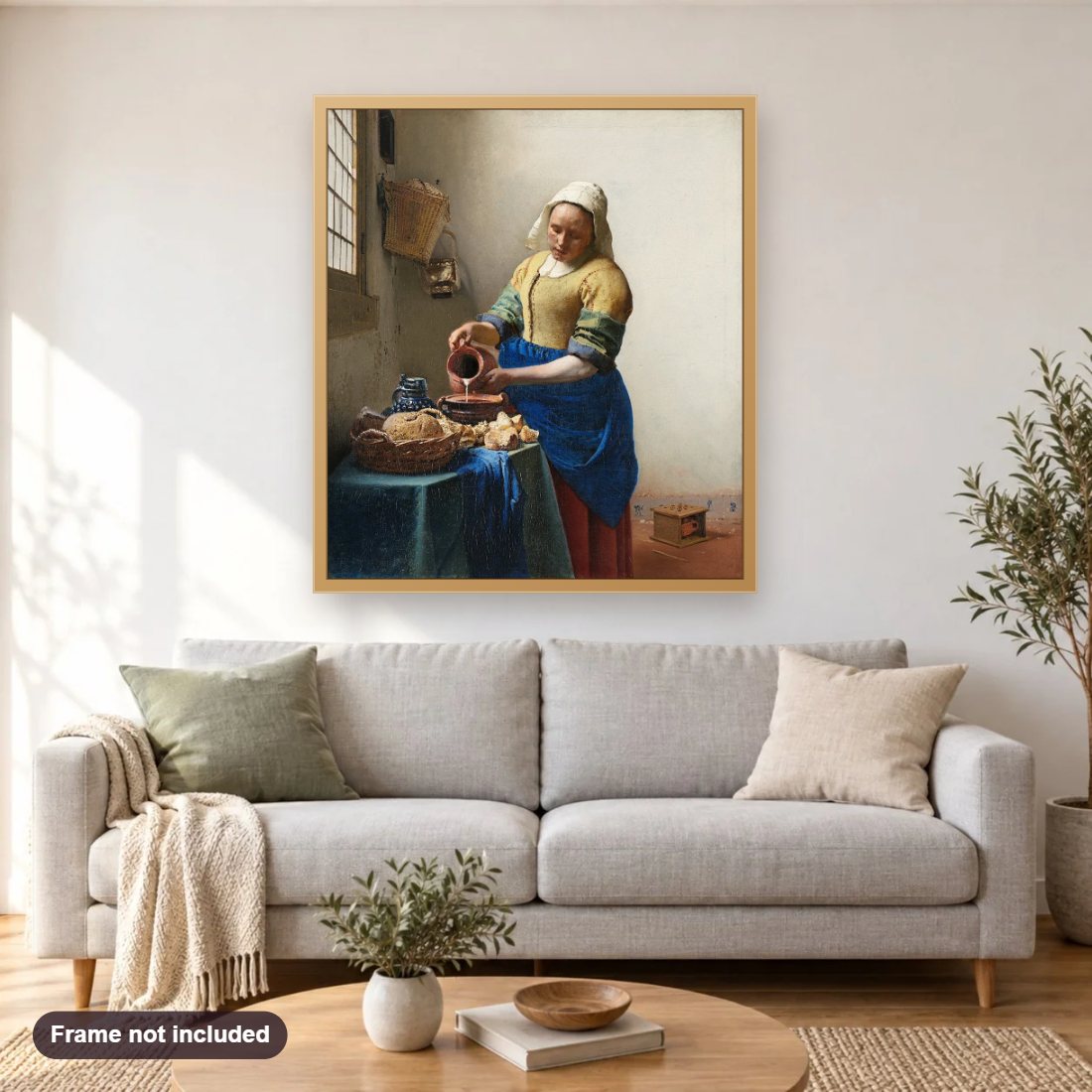 Milkmaid. Circa 1660 diamond painting shown framed on a living room wall above a sofa
