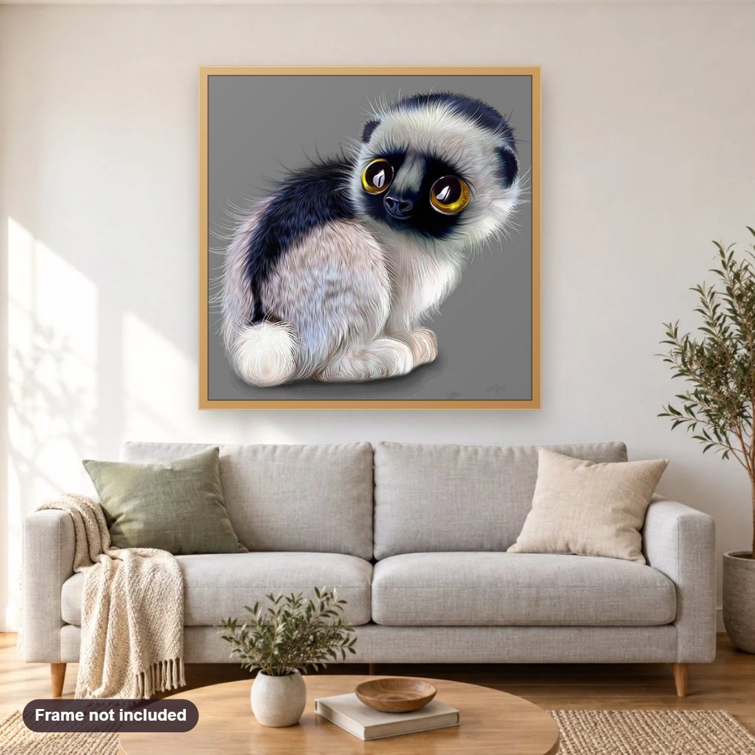 Monkey Cat Cartoon diamond painting shown framed on a living room wall above a sofa