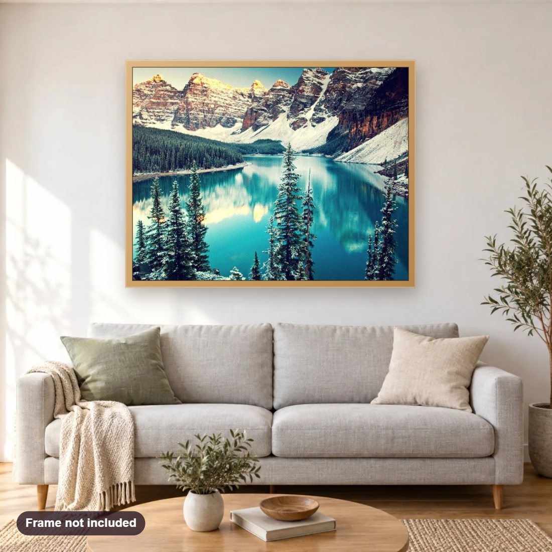 Moraine Lake diamond painting shown framed on a living room wall above a sofa