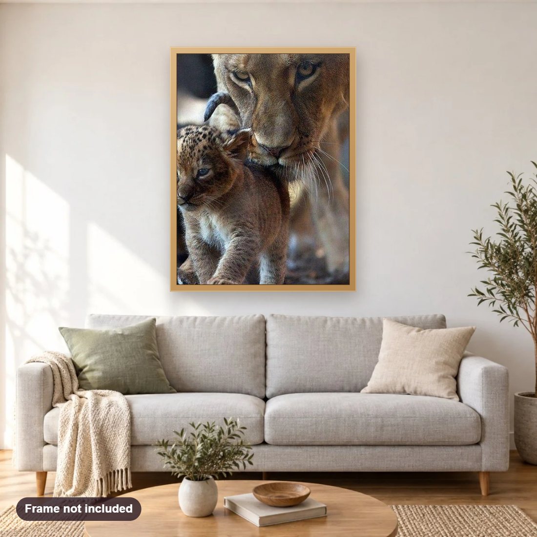 Mother & Baby Lion diamond painting shown framed on a living room wall above a sofa