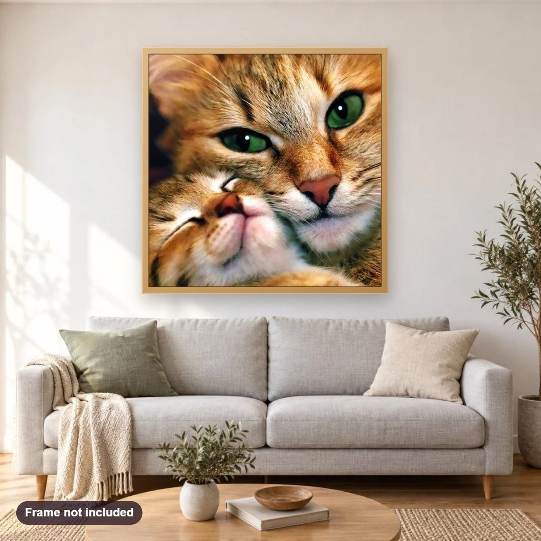 Mother Cat & Baby Cat diamond painting shown framed on a living room wall above a sofa
