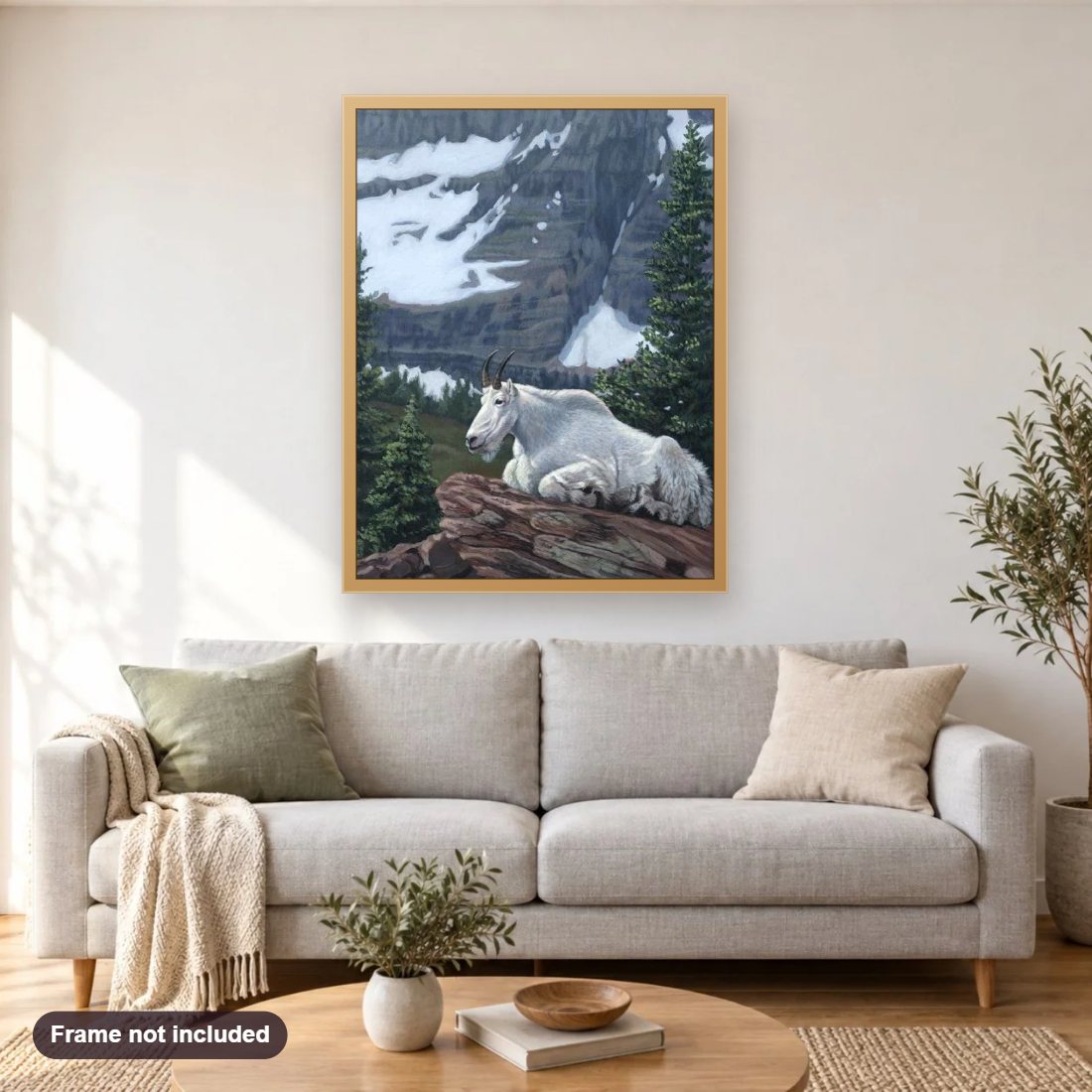 Mountain Goat diamond painting shown framed on a living room wall above a sofa