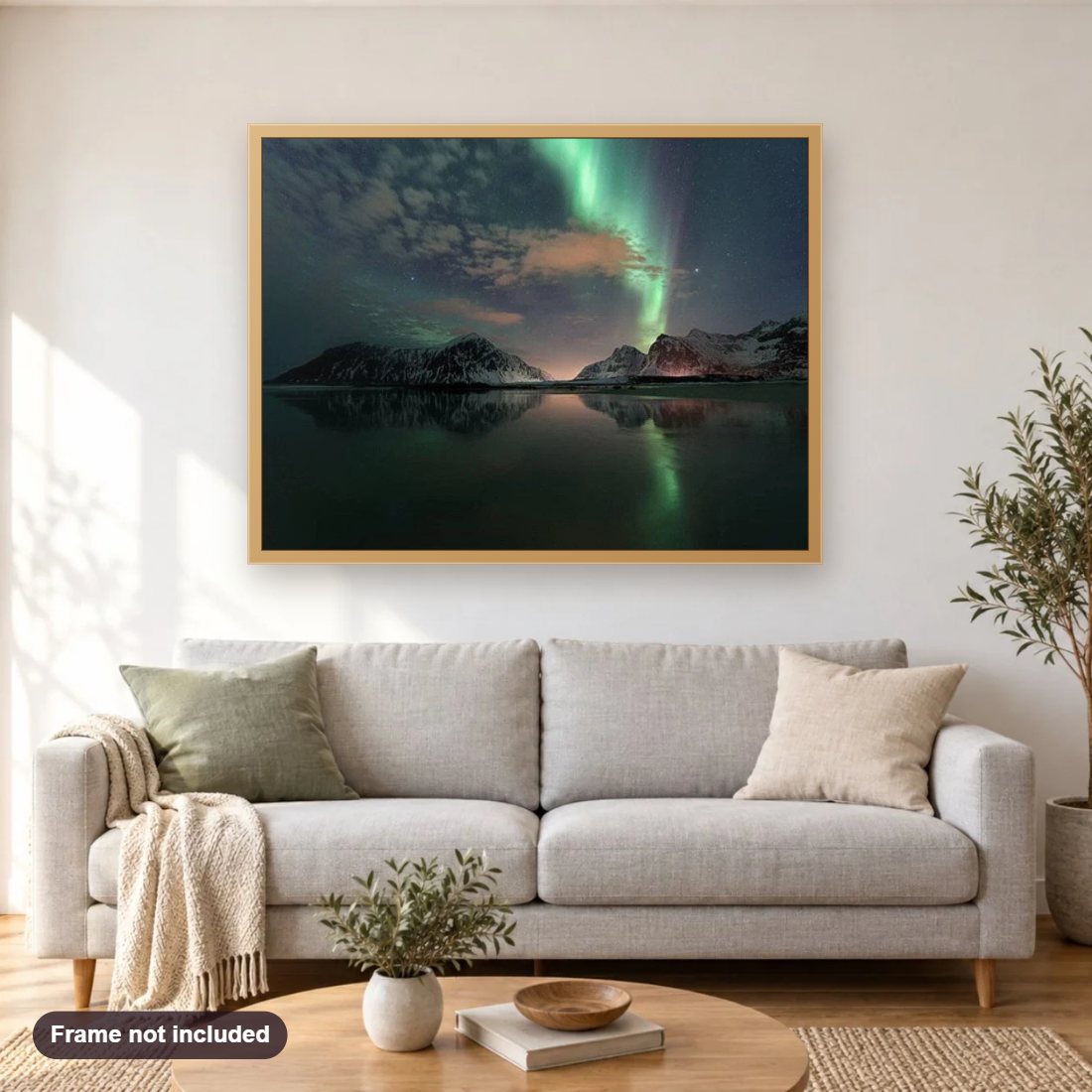 Mountains & Northern Lights Landscape diamond painting shown framed on a living room wall above a sofa